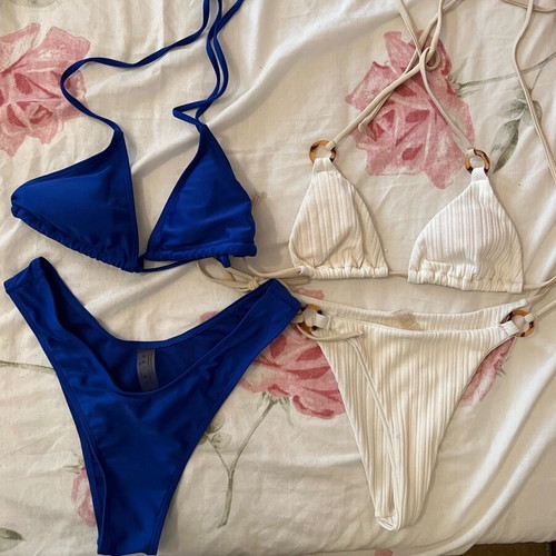 Swimwear used, set with new pink and green pieces