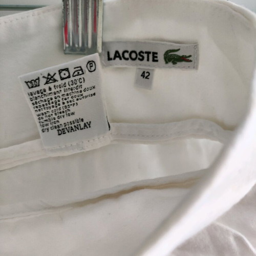 Lacoste white skirt like new with pleats and zipper