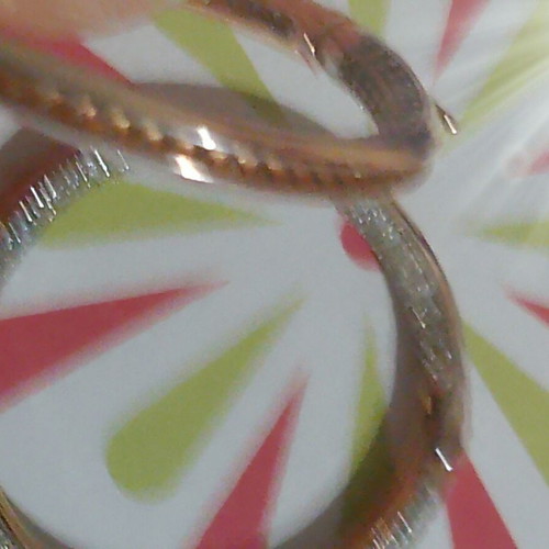 Gold hoop earrings with zircon stones