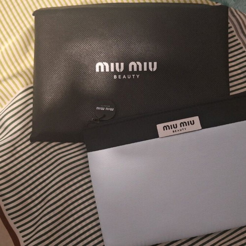Miu Miu cosmetic pouch new, black and turquoise