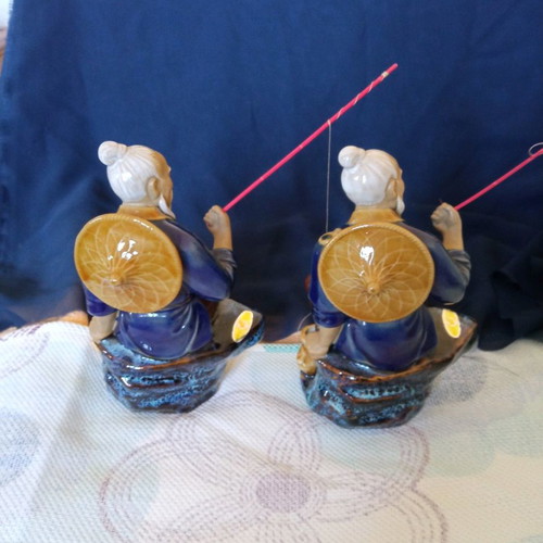 Decorative porcelain figurines used, two Chinese fishermen