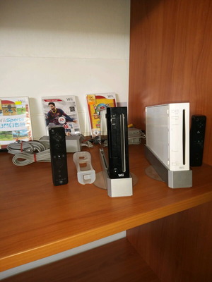 Nintendo Wii used with controller, cables, camera, and game