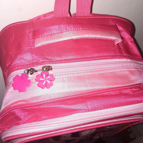 Backpack new with 3 large pockets and 2 small side pockets