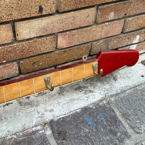Wall hanger in electric guitar shape used, handmade with metal hooks