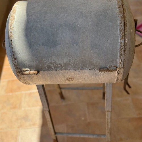 Handmade metal BBQ grill with lid used, industrial style