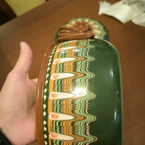 Hand-painted clay pot in excellent condition