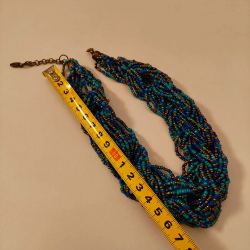 Statement necklace like new with blue and gold braided seed beads