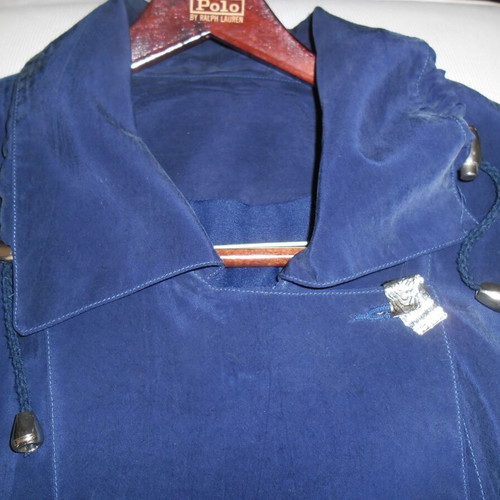 Silk blue jacket like new, long with silver buttons