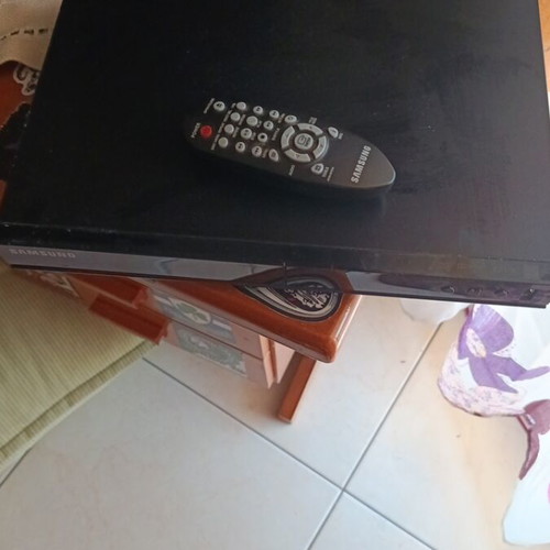 Samsung DVD player with remote control, new, dimensions 30x21