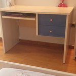Blue bedroom set with desk, bookshelves and bed