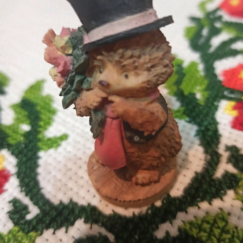 Hedgehog miniature figurine used, decorative with hat and flowers