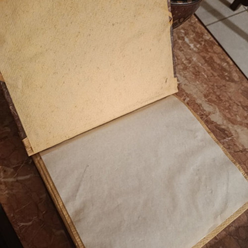 Handmade photo album with carved wooden details, vintage style