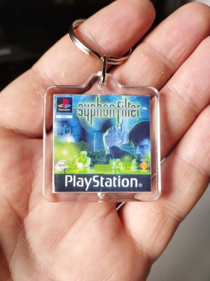 Syphon Filter PS1 keychain new acrylic