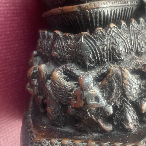 Thai Buddha statue with detailed embossed decoration