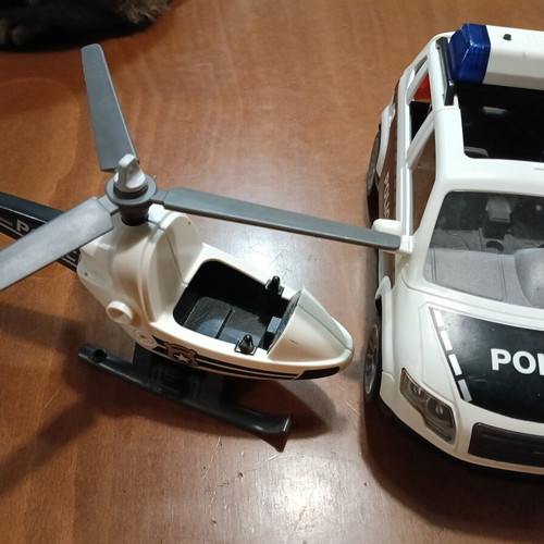 Playmobil set with helicopter and police car like new