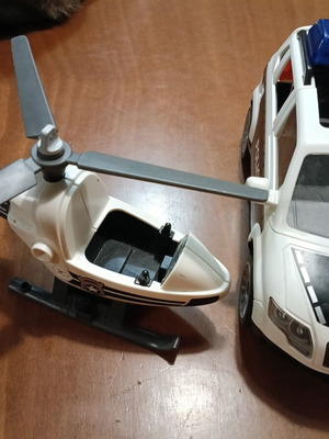 Playmobil set with helicopter and police car like new