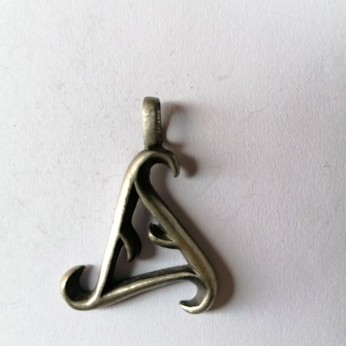 Metal tribal triangle pendant new with matte finish