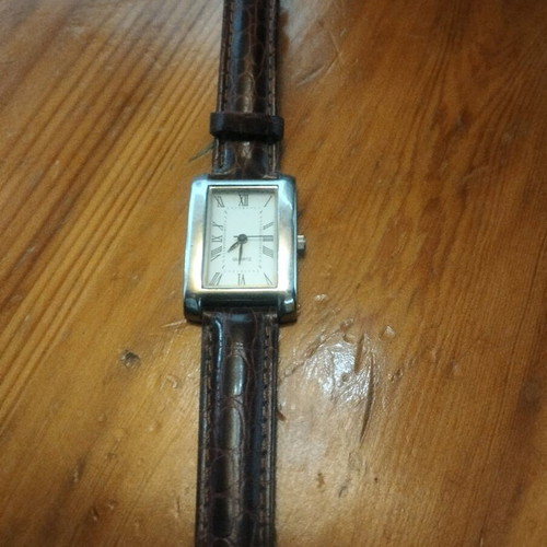 Quartz watch unused with brown leather strap, like new