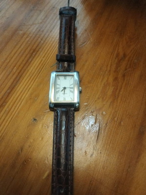 Quartz watch unused with brown leather strap, like new