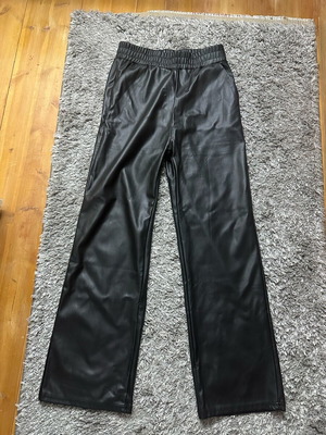 Black women's leather look pants used with fleece lining