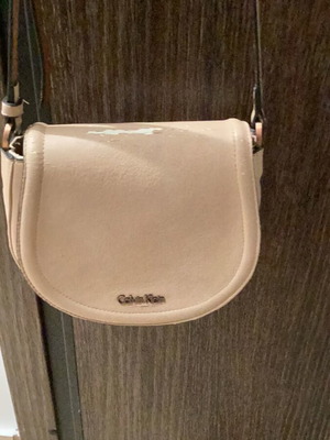 Calvin Klein crossbody bag used with wear, beige