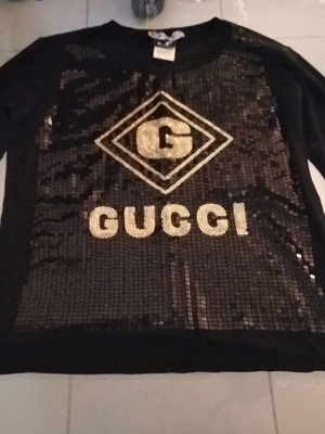 Gucci blouse used, black, size L with design