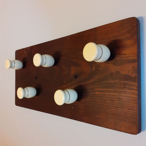 Wooden wall hanger with handles from old barber shaving brushes