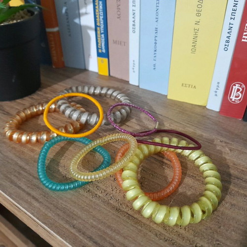 Hair ties used, colorful, all together