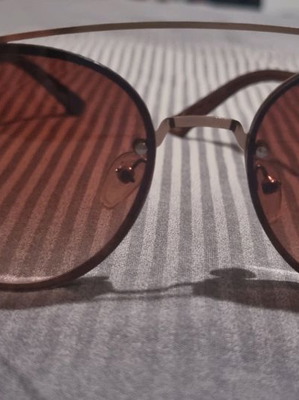 Round glasses used with brown lenses
