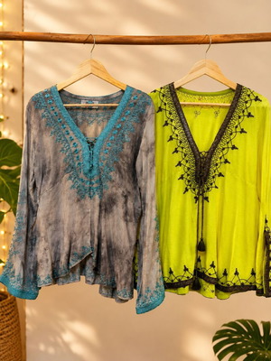 Two kaftans with handmade embroidery by Dar Mode and MAJORELLE