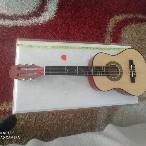 Wooden children's guitar used, 78 cm
