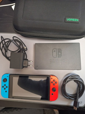 Nintendo Switch like new with original accessories and Ugreen case