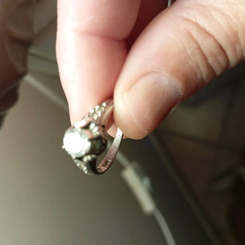 Women's white gold solitaire ring like new with zircon stones