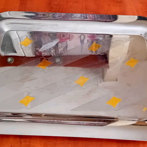 Set of three used serving trays, stainless steel inox 18/10 with gold details