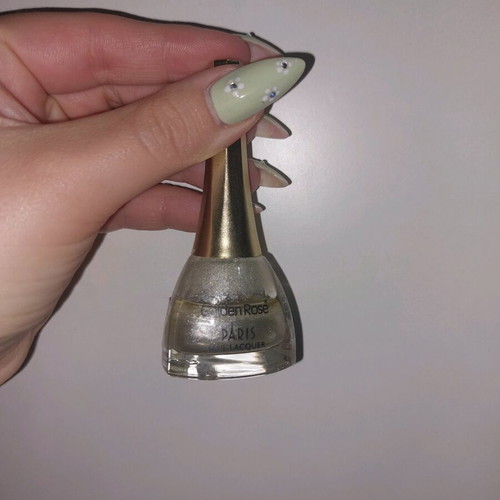 Silver nail polish used, 50% full