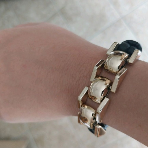 Bracelet black with gold details like new
