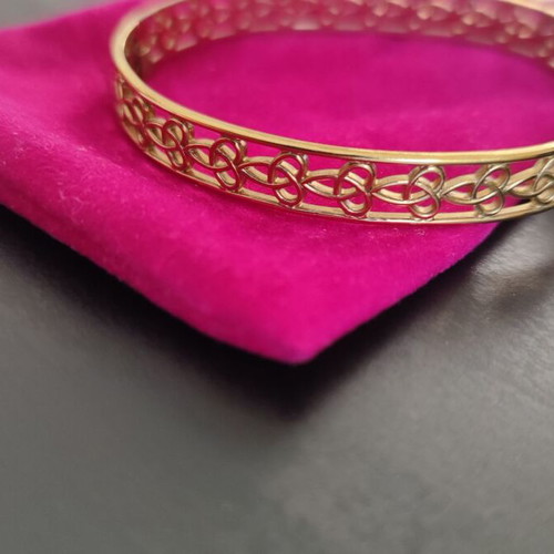 Gold stainless steel bracelet with unique design like new