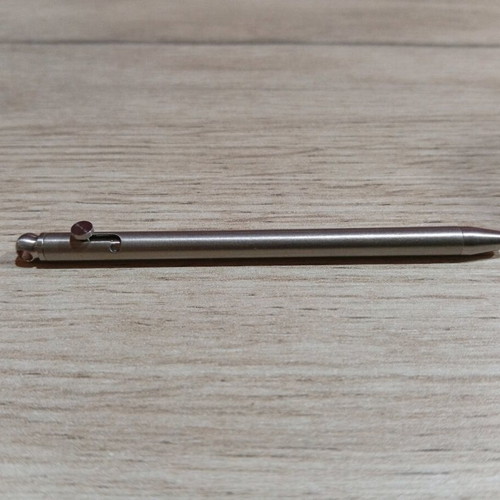 Mini titanium pen like new