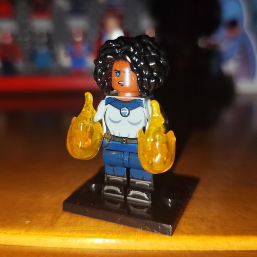 Monica Rambeau figure like new with base and energy blasts