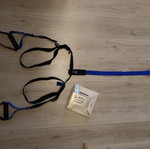 TRX strap used, blue color without ceiling hook