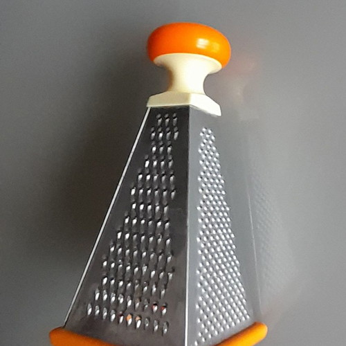 Cheese and vegetable grater used