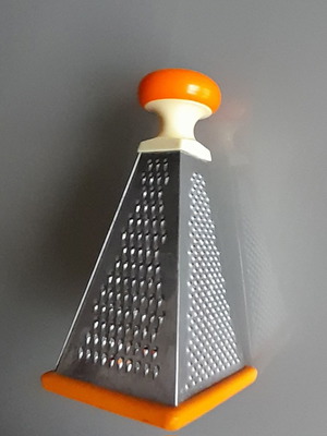 Cheese and vegetable grater used