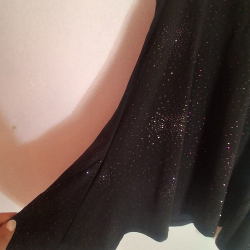 Black sleeveless top with subtle shimmer like new, sizes XS and S