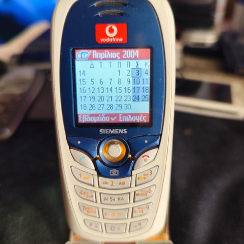 Siemens C65 mobile phone used, some keys not working, no charger