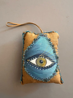 Hand-painted pillow used for charm or decor