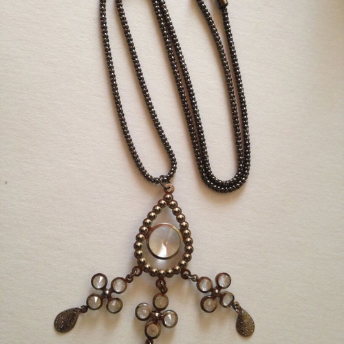 Long necklace used, silver color