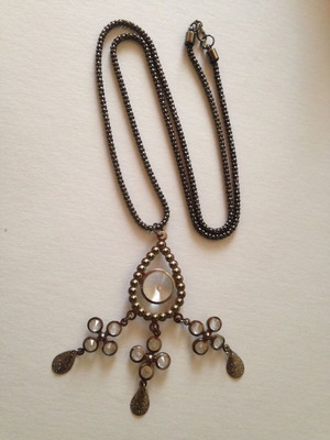 Long necklace used, silver color