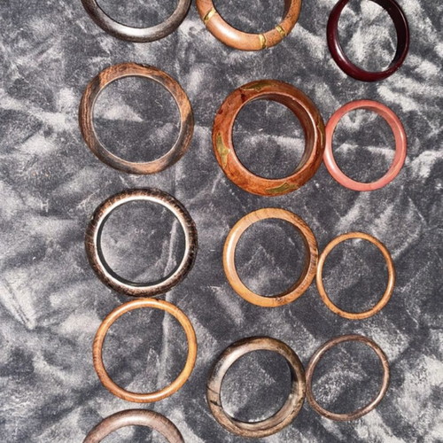 Bracelets new, wooden, plastic and iron multicolor
