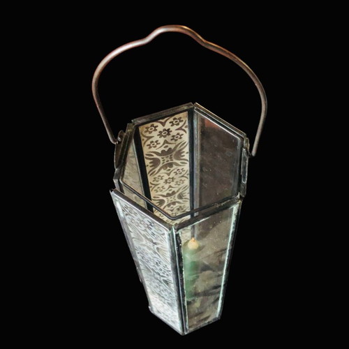 Lantern used, black with decoration on glass parts, opening design
