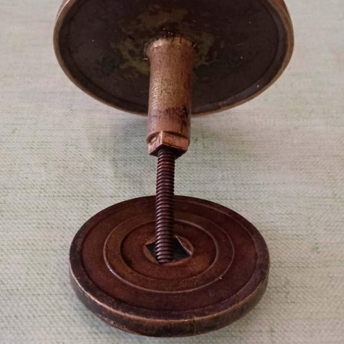 Bronze door knob used with geometric star pattern